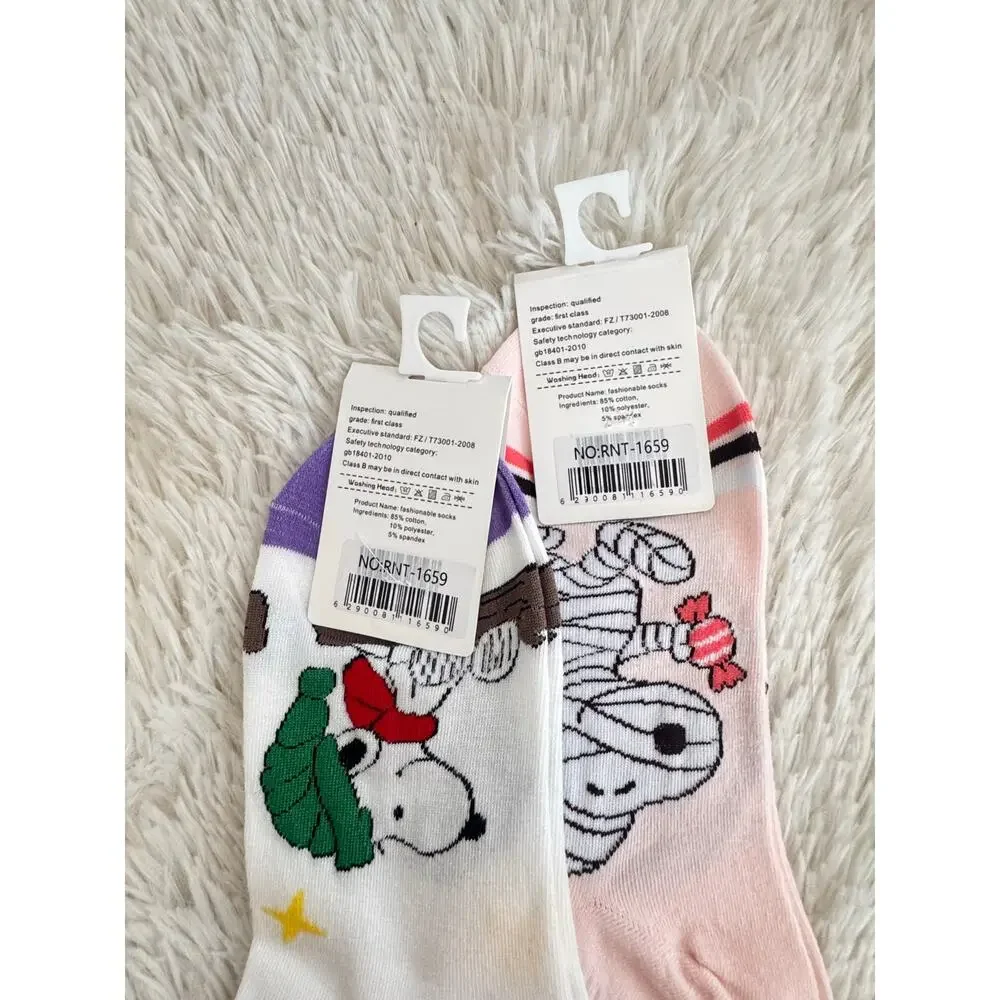 Snoopy ankle socks with Snoopy wearing green hat and red scarf and mummy costume